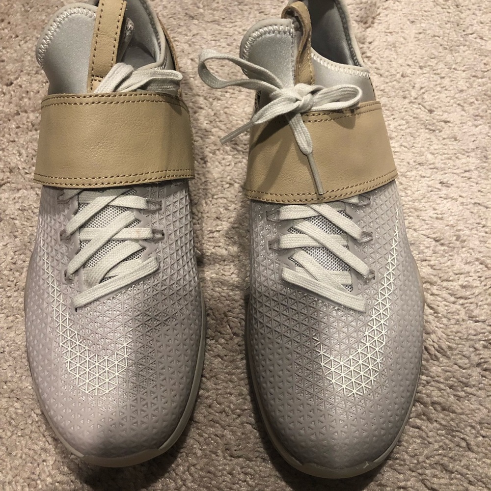 Women size 6 Nike Beige/Khaki sneakers.